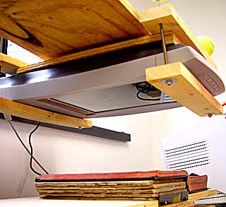 The inverted scanner mounted on the lifting arm